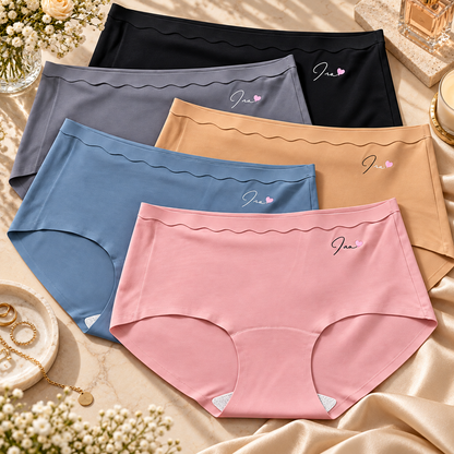 Assorted solid-colour ladies’ seamless panties with wave-edge waistband detail